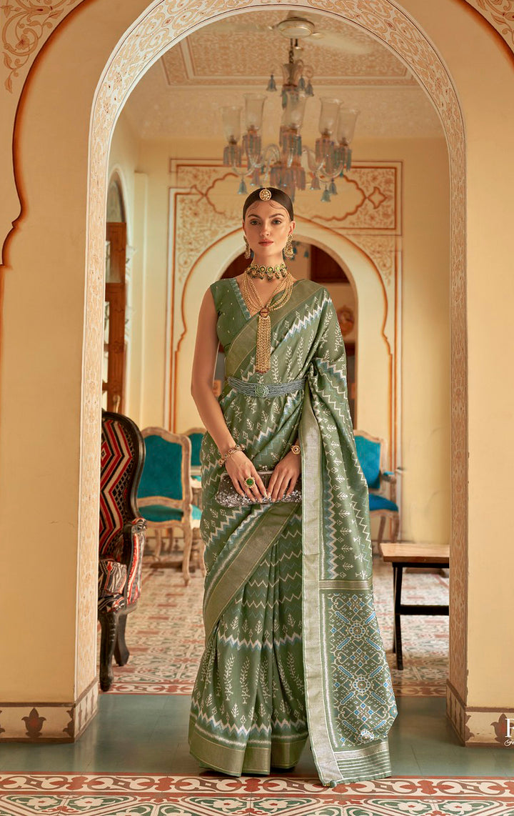 Enchanting Light Green Patola Silk Saree