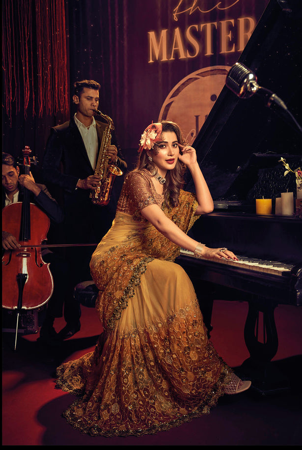 Explore the Glamour of Golden Designer Sarees