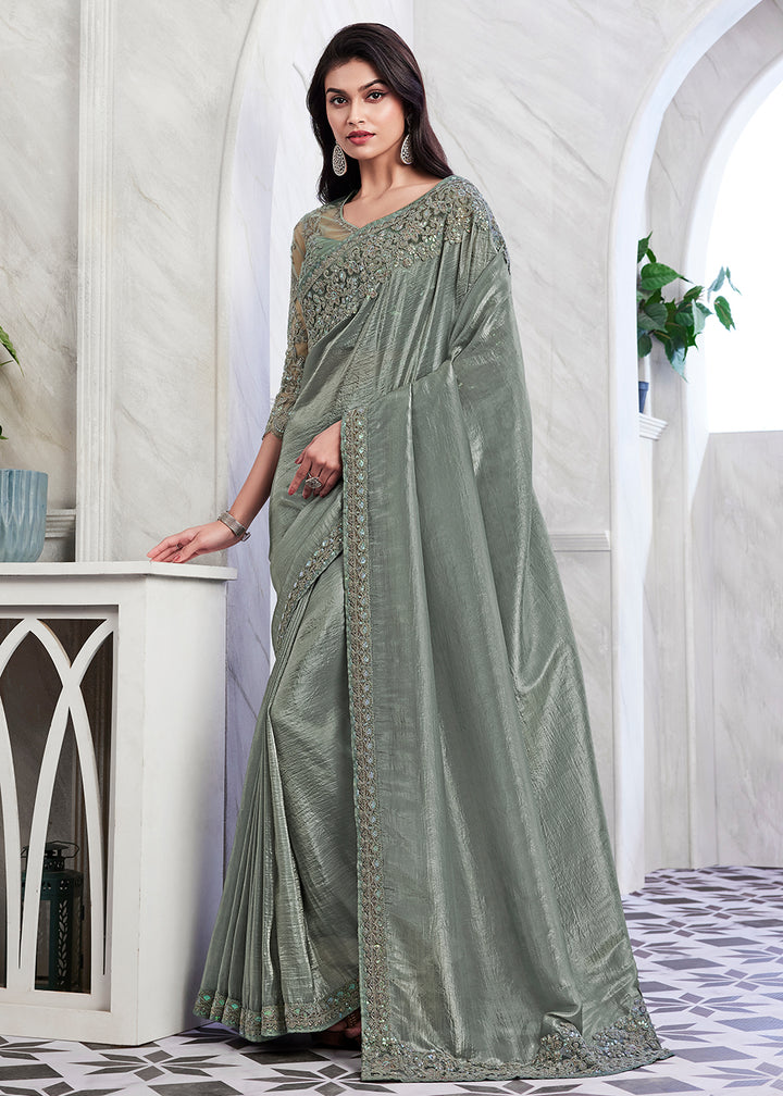 Elegant Light Green Silk and Linen Saree with Exquisite Embroidery