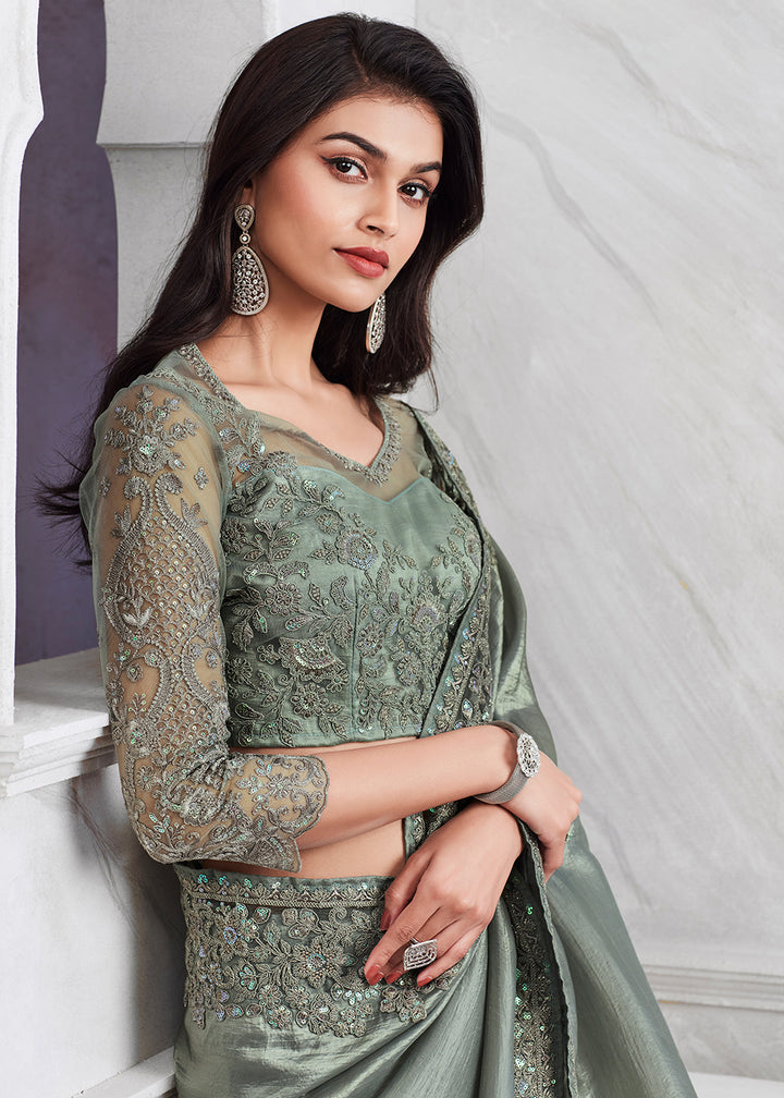 Elegant Light Green Silk and Linen Saree with Exquisite Embroidery