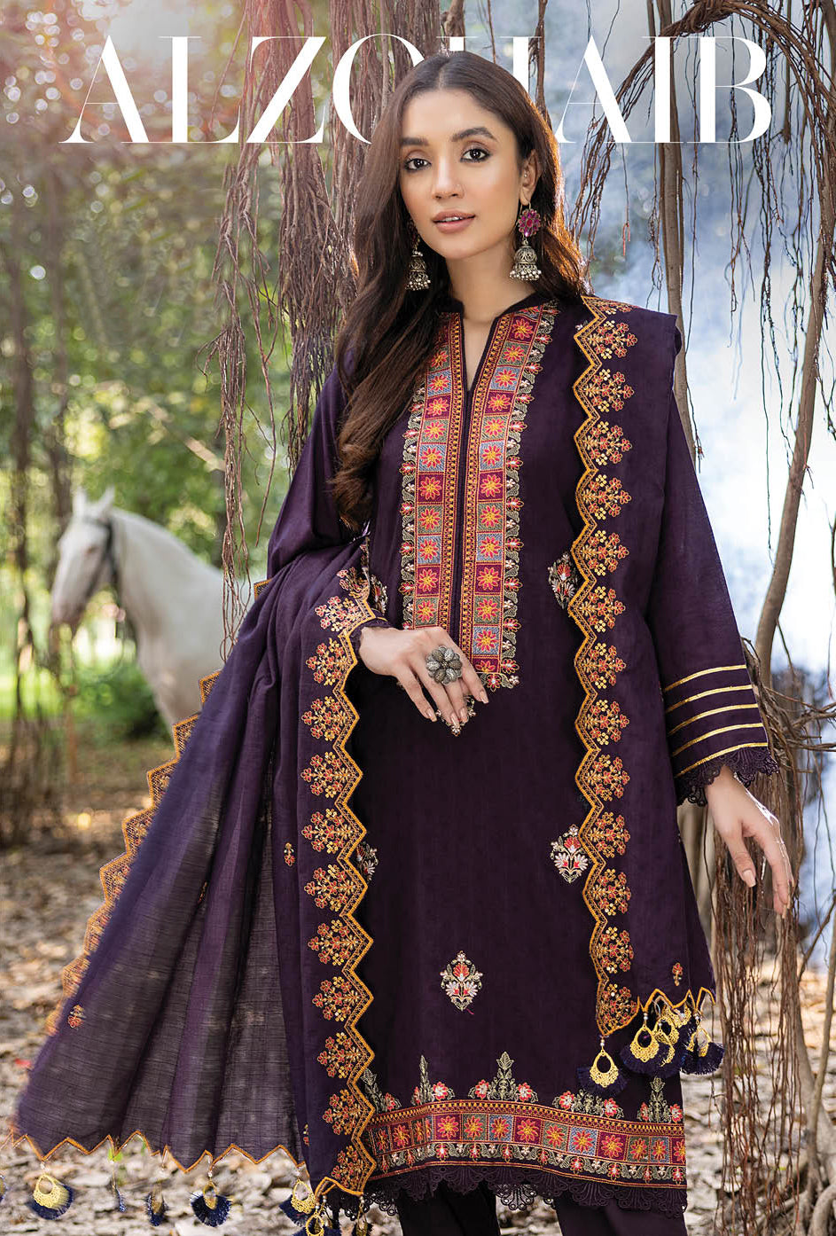 Purple embroidered Pakistani Salwar Suits